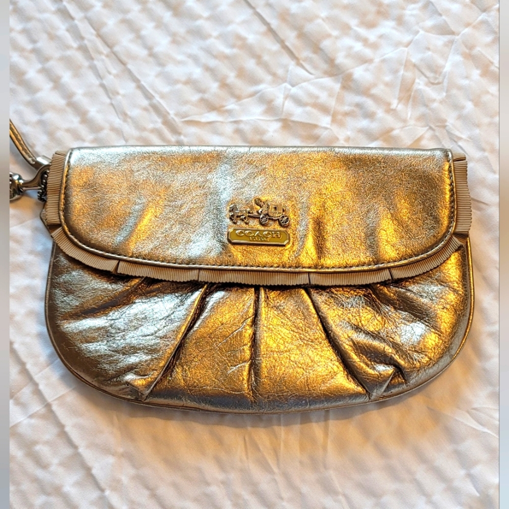 COACH gold wristlet/small clutch